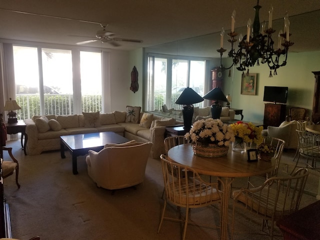 dining room with carpet and ceiling fan