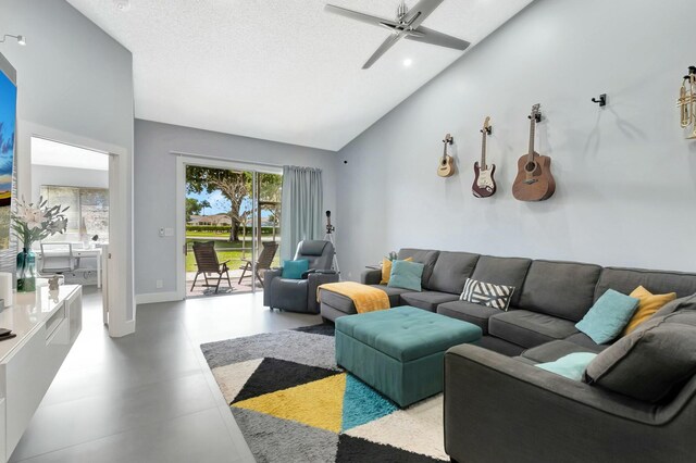 9238 E Vineland Ct E Unit E, Boca Raton, FL 33496 - living area featuring baseboards, high vaulted ceiling, ceiling fan, and a textured ceiling