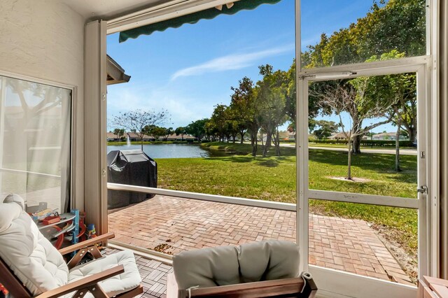 9238 E Vineland Ct E Unit E, Boca Raton, FL 33496 - sunroom / solarium with a water view