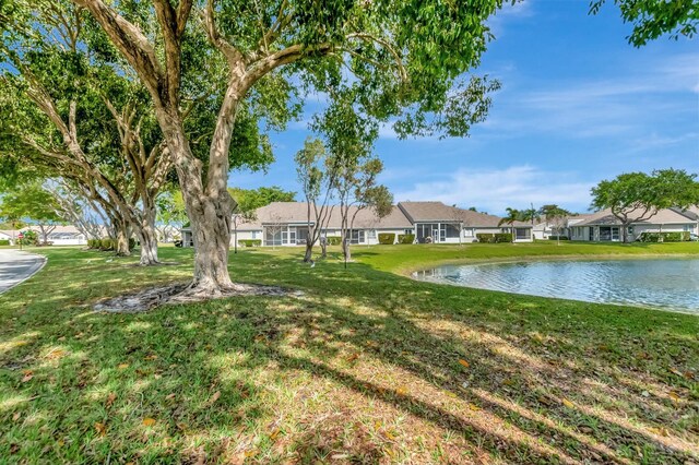 9238 E Vineland Ct E Unit E, Boca Raton, FL 33496 - view of yard with a water view and a residential view