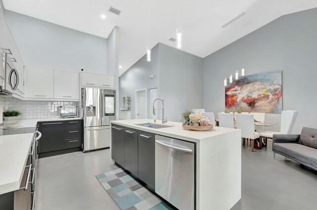9238 E Vineland Ct E Unit E, Boca Raton, FL 33496 - kitchen with a sink, stainless steel appliances, white cabinets, and light countertops