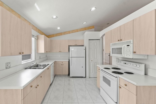 7267 Modena Dr, Boynton Beach, FL 33437 - kitchen with white appliances, light brown cabinetry, and light countertops