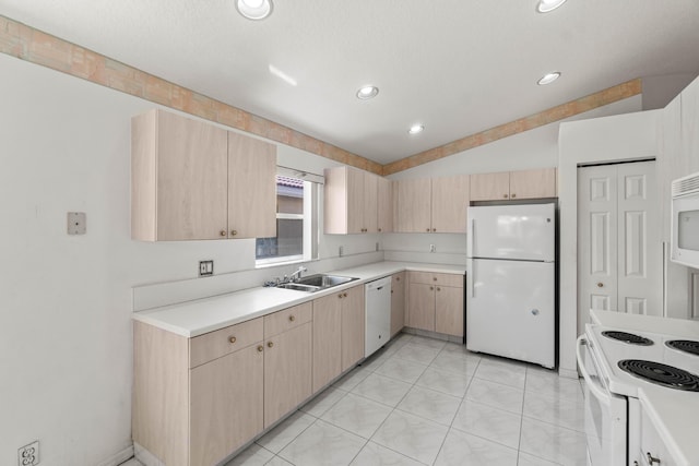 7267 Modena Dr, Boynton Beach, FL 33437 - kitchen featuring light brown cabinetry, white appliances, light countertops, and a sink
