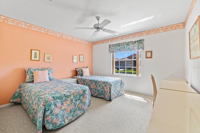 7267 Modena Dr, Boynton Beach, FL 33437 - carpeted bedroom with baseboards, a textured ceiling, and ceiling fan