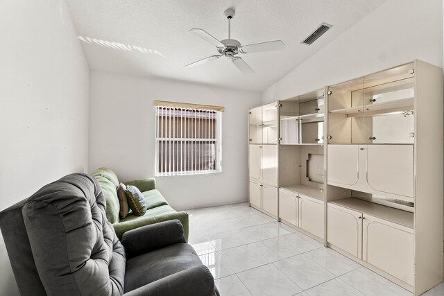 7267 Modena Dr, Boynton Beach, FL 33437 - interior space with vaulted ceiling, light tile patterned flooring, a ceiling fan, and visible vents