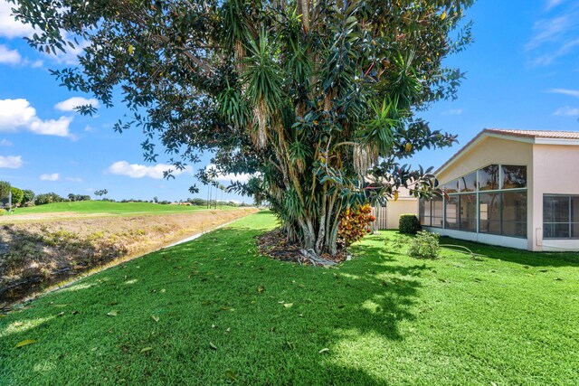 7267 Modena Dr, Boynton Beach, FL 33437 - view of yard featuring a sunroom