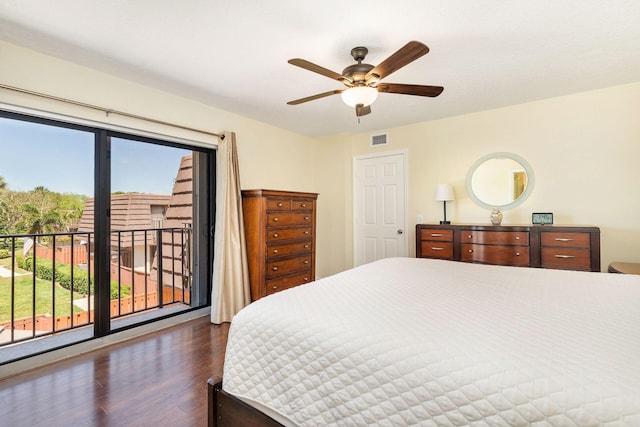 bedroom featuring ceiling fan, visible vents, dark wood-type flooring, and access to exterior