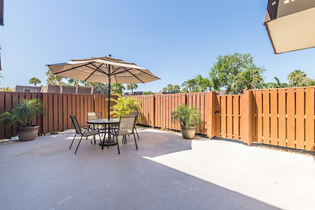 view of patio / terrace with outdoor dining area and a fenced backyard