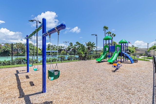 community playground featuring fence