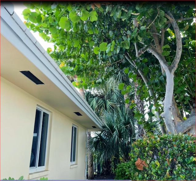 exterior details featuring stucco siding