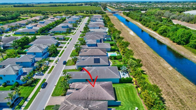 7855 Wildflower Shores Dr, Delray Beach, FL 33446 - drone / aerial view featuring a residential view and a water view