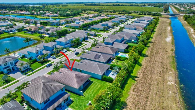 7855 Wildflower Shores Dr, Delray Beach, FL 33446 - birds eye view of property featuring a residential view and a water view