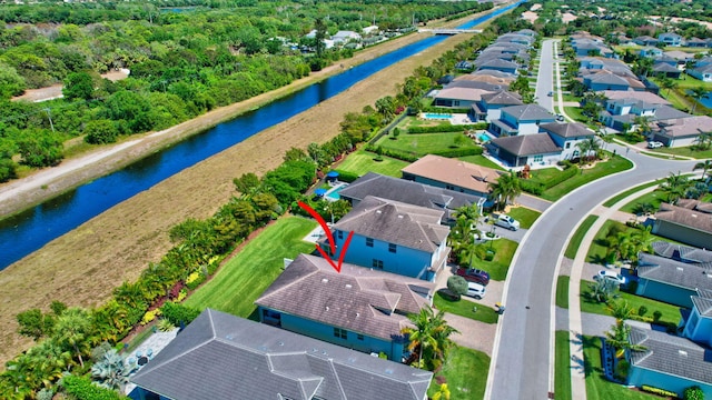 7855 Wildflower Shores Dr, Delray Beach, FL 33446 - birds eye view of property with a residential view and a water view