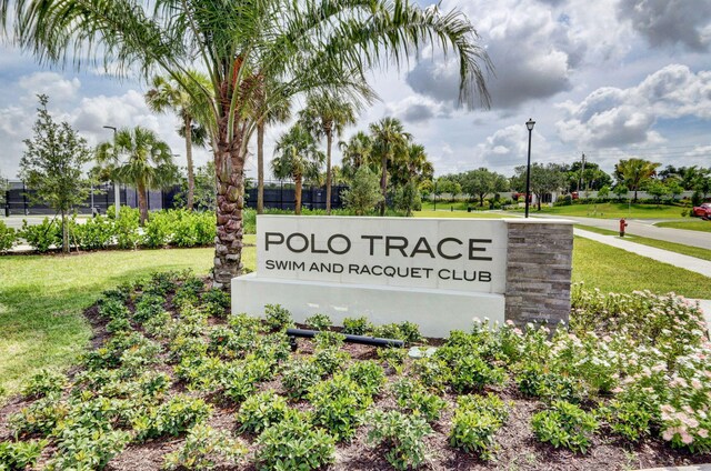 7855 Wildflower Shores Dr, Delray Beach, FL 33446 - community / neighborhood sign with a lawn