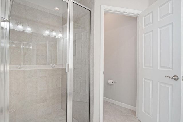 11243 SW Parkside Dr, Port Saint Lucie, FL 34987 - full bathroom with baseboards, a shower stall, and tile patterned flooring
