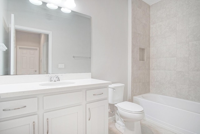 full bath featuring tile patterned flooring, toilet, vanity, and bathing tub / shower combination