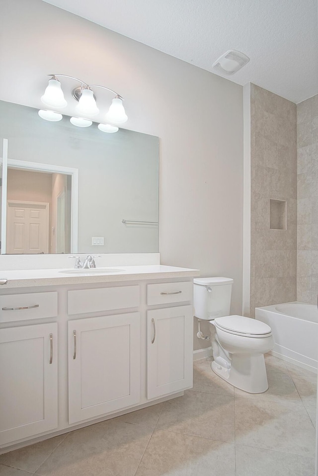 full bathroom with tile patterned floors, visible vents, toilet, and vanity