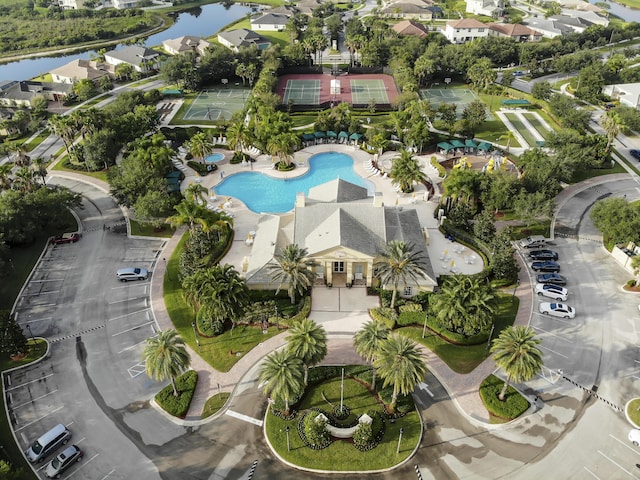 bird's eye view with a residential view and a water view