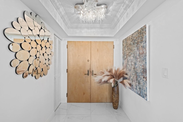 3450 S Ocean Blvd Unit 605, Highland Beach, FL 33487 - corridor with a chandelier, a raised ceiling, marble look tile flooring, and baseboards