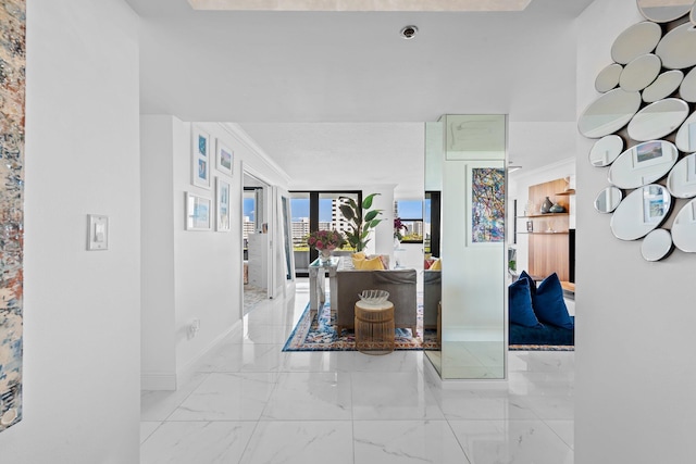 3450 S Ocean Blvd Unit 605, Highland Beach, FL 33487 - hallway with baseboards and light marble finish flooring