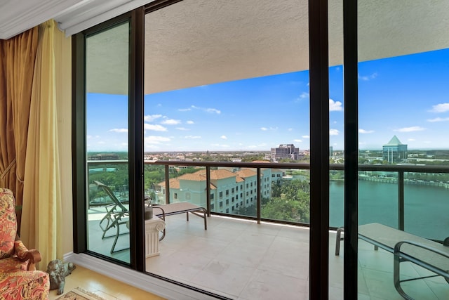 3620 Gardens Pkwy Unit 1001B, Palm Beach Gardens, FL 33410 - balcony with a water view and a view of city