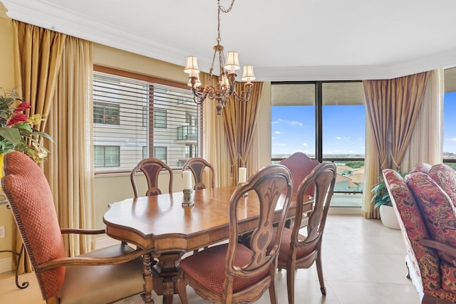 3620 Gardens Pkwy Unit 1001B, Palm Beach Gardens, FL 33410 - dining room featuring a chandelier and healthy amount of natural light