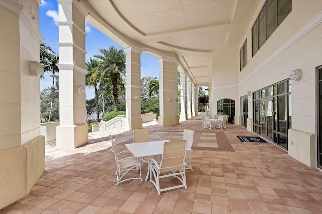 3620 Gardens Pkwy Unit 1001B, Palm Beach Gardens, FL 33410 - view of patio featuring outdoor dining area
