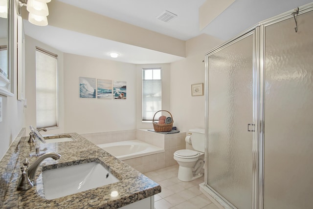 full bath featuring tile patterned flooring, a stall shower, toilet, and a sink