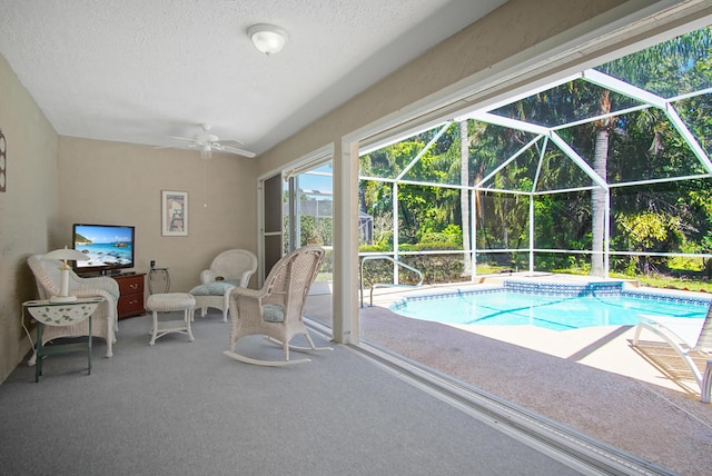 outdoor pool with a ceiling fan
