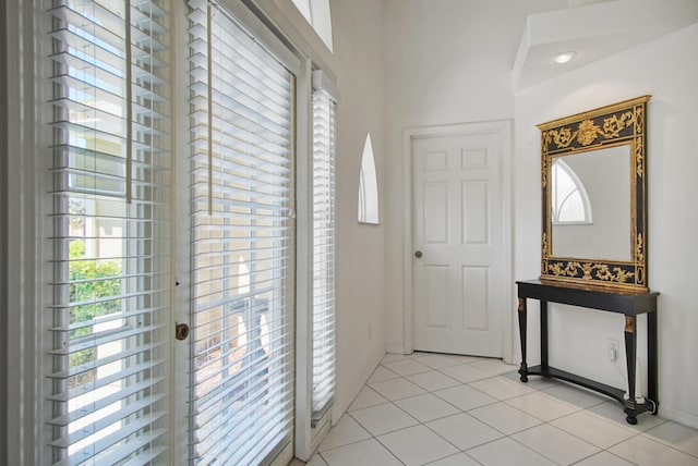 entrance foyer featuring light tile patterned floors