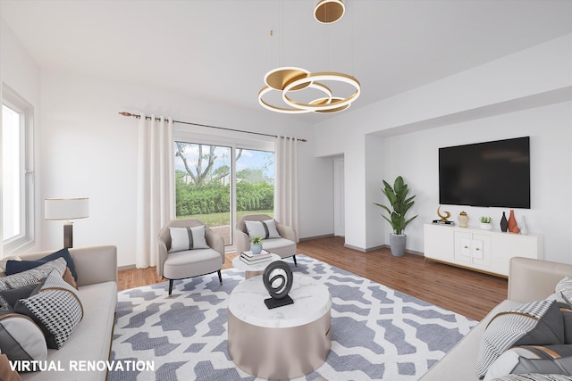 living room with an inviting chandelier and wood finished floors