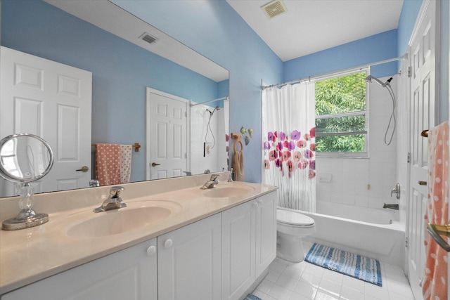 full bath featuring tile patterned flooring, visible vents, and a sink