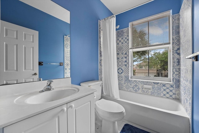 full bath featuring vanity, toilet, and shower / bath combo with shower curtain