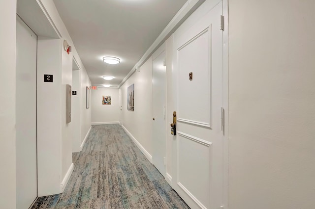 1523 Bridgewood Dr, Boca Raton, FL 33434 - hall with elevator, baseboards, and wood finished floors