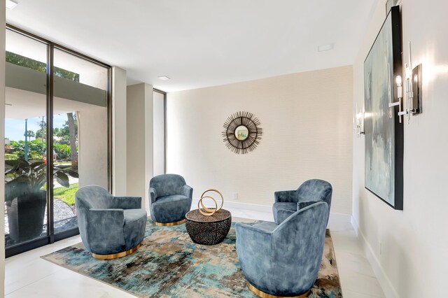 1523 Bridgewood Dr, Boca Raton, FL 33434 - sitting room with expansive windows and baseboards