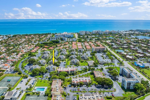 bird's eye view with a water view