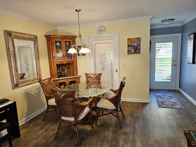 dining area featuring baseboards, dark wood finished floors, and ornamental molding