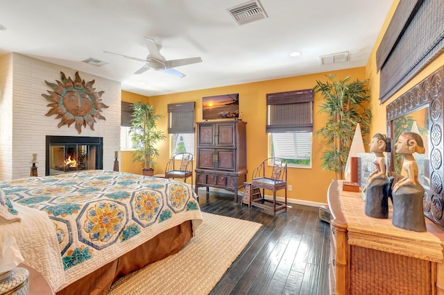 110 Dolphin Rd, Ocean Ridge, FL 33435 - bedroom featuring baseboards, dark wood-style floors, a fireplace, ceiling fan, and recessed lighting