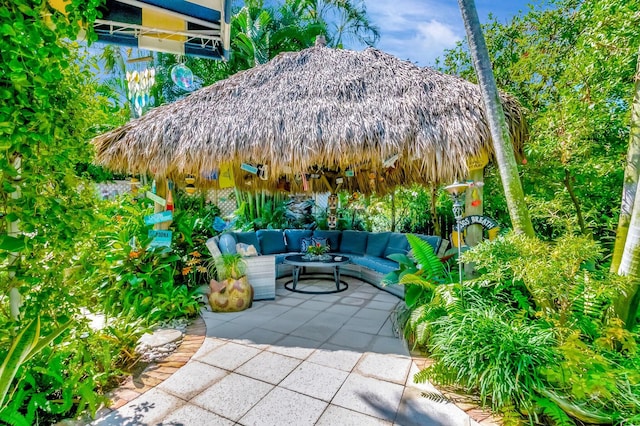 110 Dolphin Rd, Ocean Ridge, FL 33435 - view of patio / terrace with an outdoor living space, a gazebo, and a mountain view