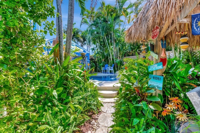 110 Dolphin Rd, Ocean Ridge, FL 33435 - view of yard with a pool