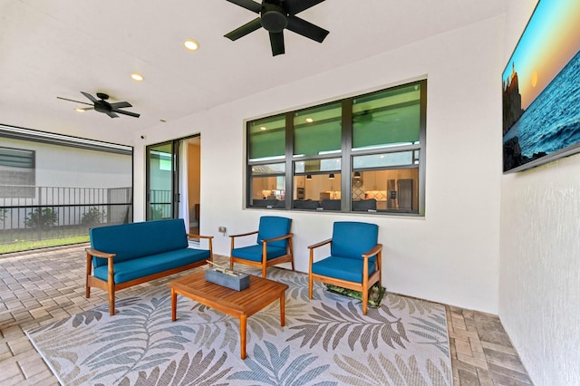view of patio / terrace with outdoor lounge area and a ceiling fan