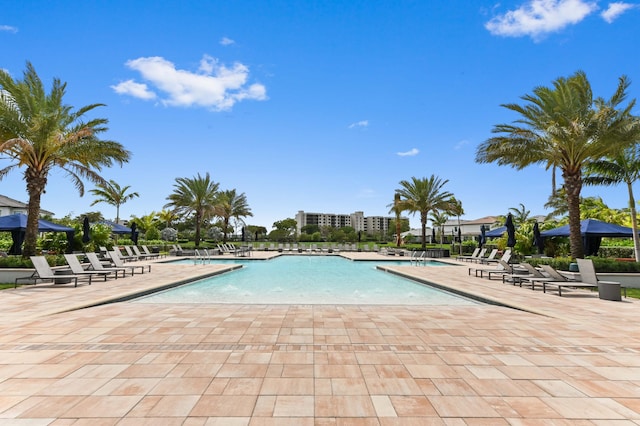 community pool featuring a patio area