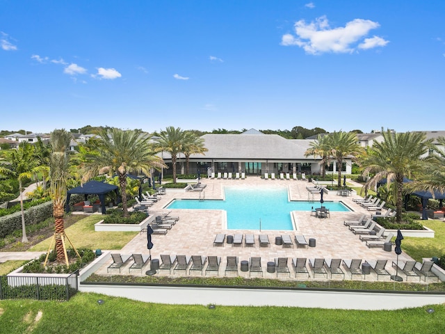community pool with a patio