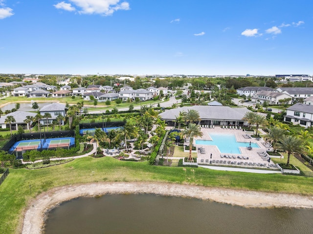birds eye view of property with a residential view