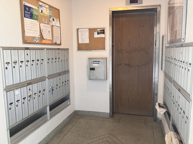 interior space featuring mail area