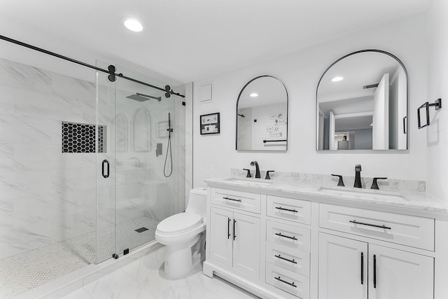 bathroom with a shower stall, toilet, double vanity, recessed lighting, and a sink