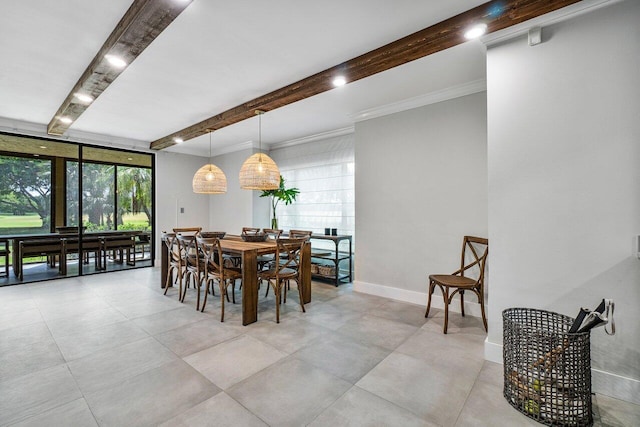 dining room with crown molding, beamed ceiling, and baseboards