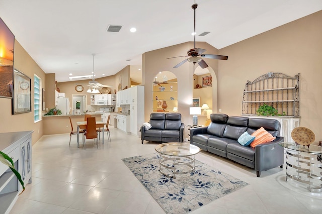 12589 Via Ravenna, Boynton Beach, FL 33436 - living area featuring visible vents, vaulted ceiling, light tile patterned floors, recessed lighting, and a ceiling fan