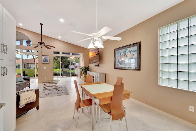 12589 Via Ravenna, Boynton Beach, FL 33436 - dining room featuring light tile patterned floors, lofted ceiling, recessed lighting, arched walkways, and ceiling fan