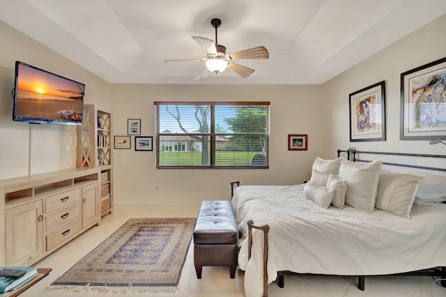 12589 Via Ravenna, Boynton Beach, FL 33436 - bedroom with light tile patterned floors, a raised ceiling, and ceiling fan